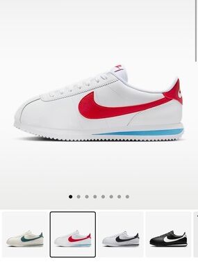 Nike White Leather Sneakers with Red Swoosh and Blue Midsole Stripe